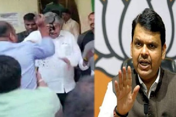 Man throws ink at Maharashtra minister Chandrakant Patil 