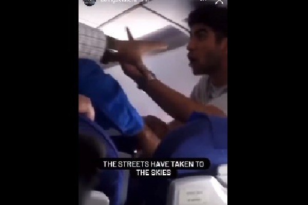 Man fights with co passenger on flight in viral video
