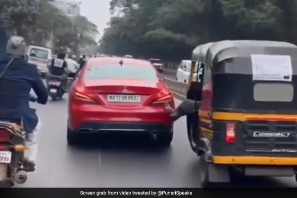 Auto Driver Pushes Mercedes With His Leg