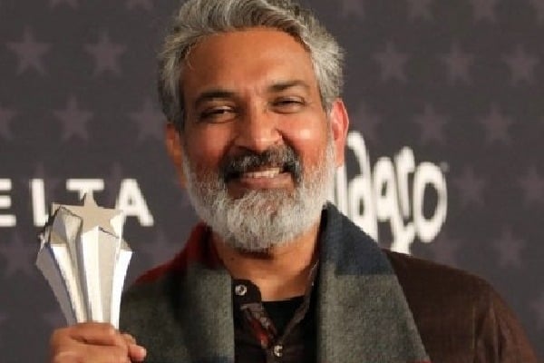 CCA2023: S.S. Rajamouli poses with award