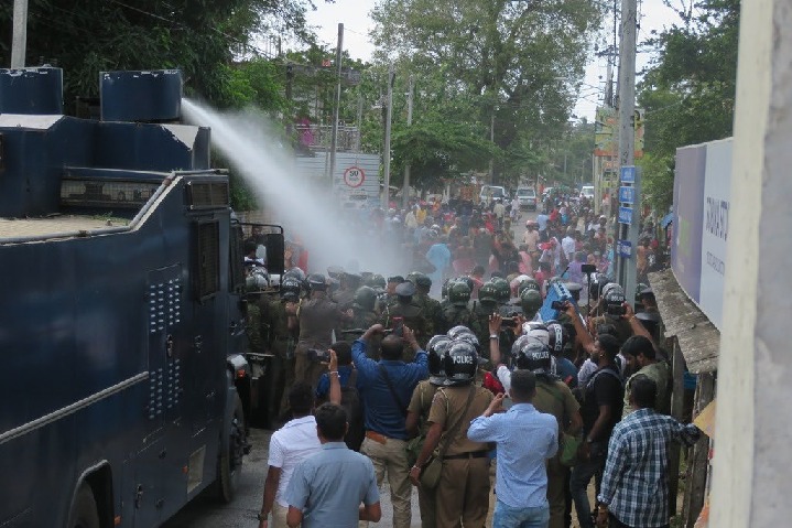 Tamil Protesters In Sri Lanka Pull Out Shampoo To Wash Hair As Police Fire Water Cannons