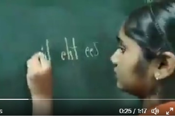 Girl simultaneously writes with both hands video stuns netizens