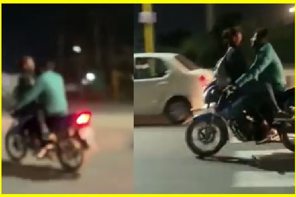 Couple romances dangerously on a moving bike in Ajmer Rajasthan