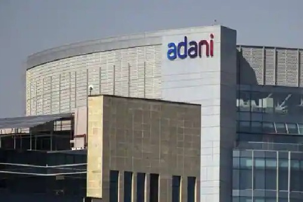 Adani group firms pledge shares for lenders of flagship company sbi cap trustee