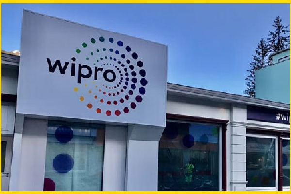 Wipro cuts freshers pay by 50 per cent