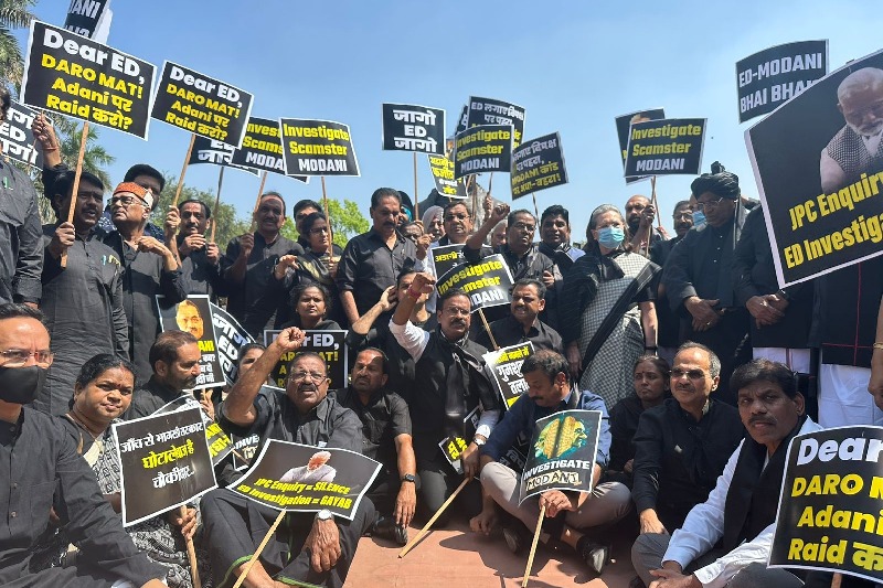Congress-led oppn members protest outside Parliament, seek probe in Adani matter