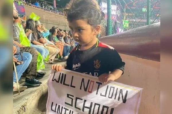 This pic of little girl holding a placard during IPL match goes viral