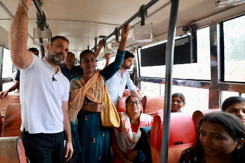 rahul gandhi takes bus ride in bengaluru interacts with college students and working women