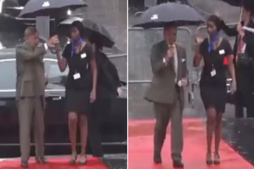 Pak minister takes umbrella away woman officer gets drenched in rain video goes viral