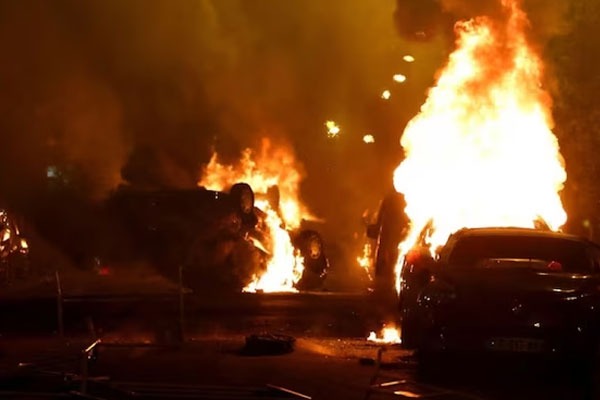 Clashes and torched cars in France over police killing of African teen