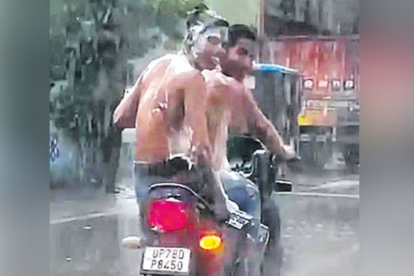 Bikers take bath in rain while riding in uttarpradesh