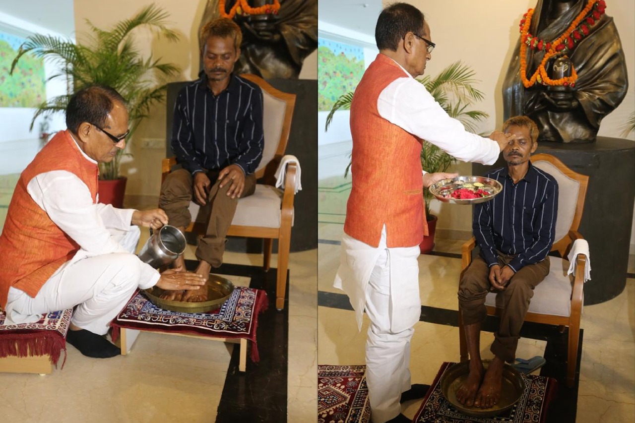 MP CM Chouhan washes tribal man's feet who was urinated on