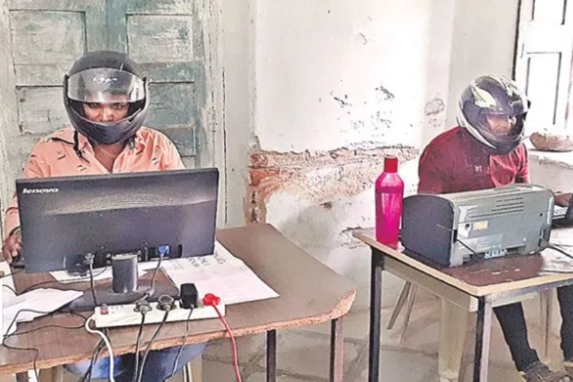 Jagitial Birpur mpdo office in dilapidated state employees attend duties wearing helmets