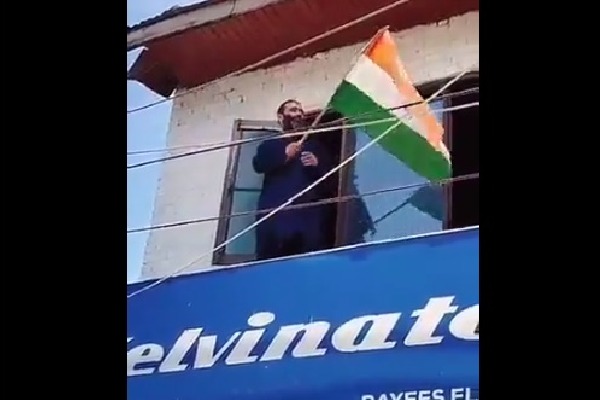 Brother of terrorisnt hoists tri coulour flag