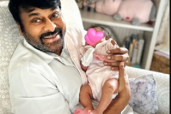 Chiranjeevi smiles holding newborn granddaughter on bday, Ram Charan shares pic