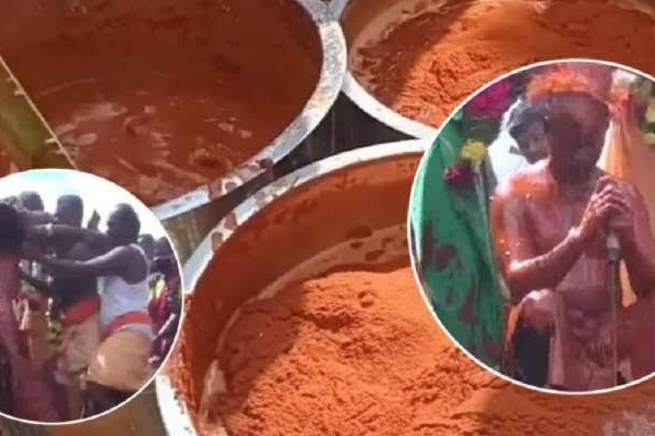 priest bathes in water mixed with 108kg chilli powder vedio Tamil Nadu 