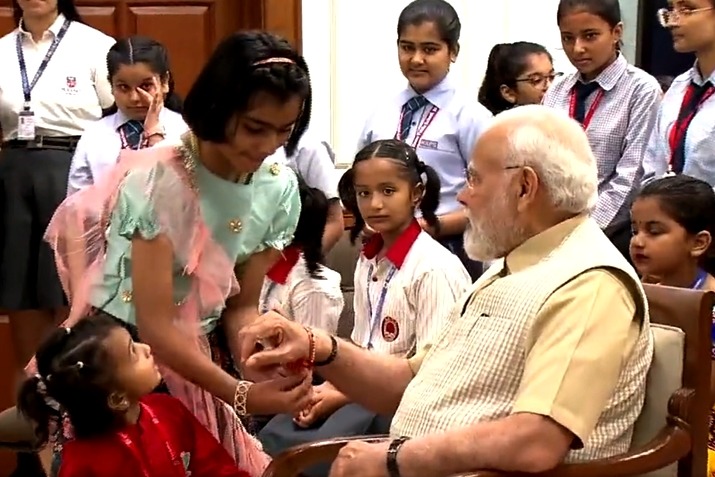 PM celebrates Raksha Bandhan with school girls