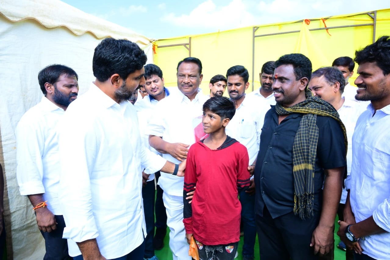 Nara Lokesh talks to bow who injured in stone pelting incident