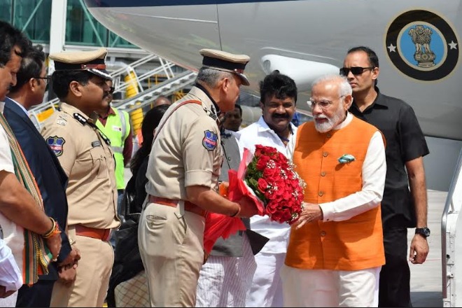 PICS: PM Modi arrived today at Shamshabad Airport for participating official programs in Mahabubnagar district