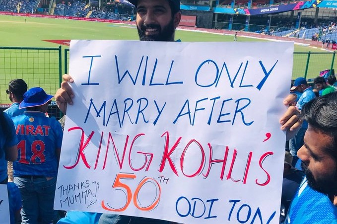 Fan displays a placard about his marriage linked with Kohli 50th ODI ton