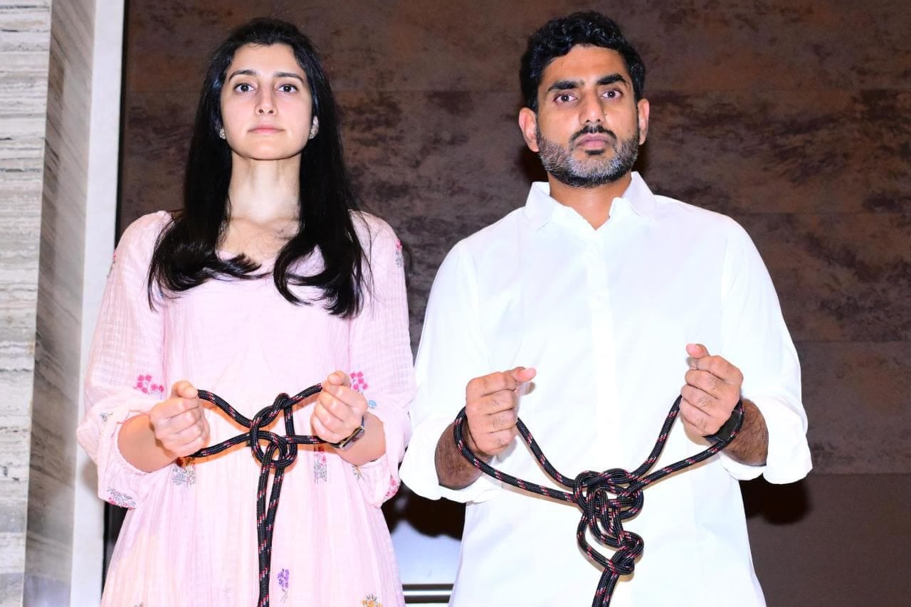 Nara Lokesh and Brahmani tied their hands with rope and protest 