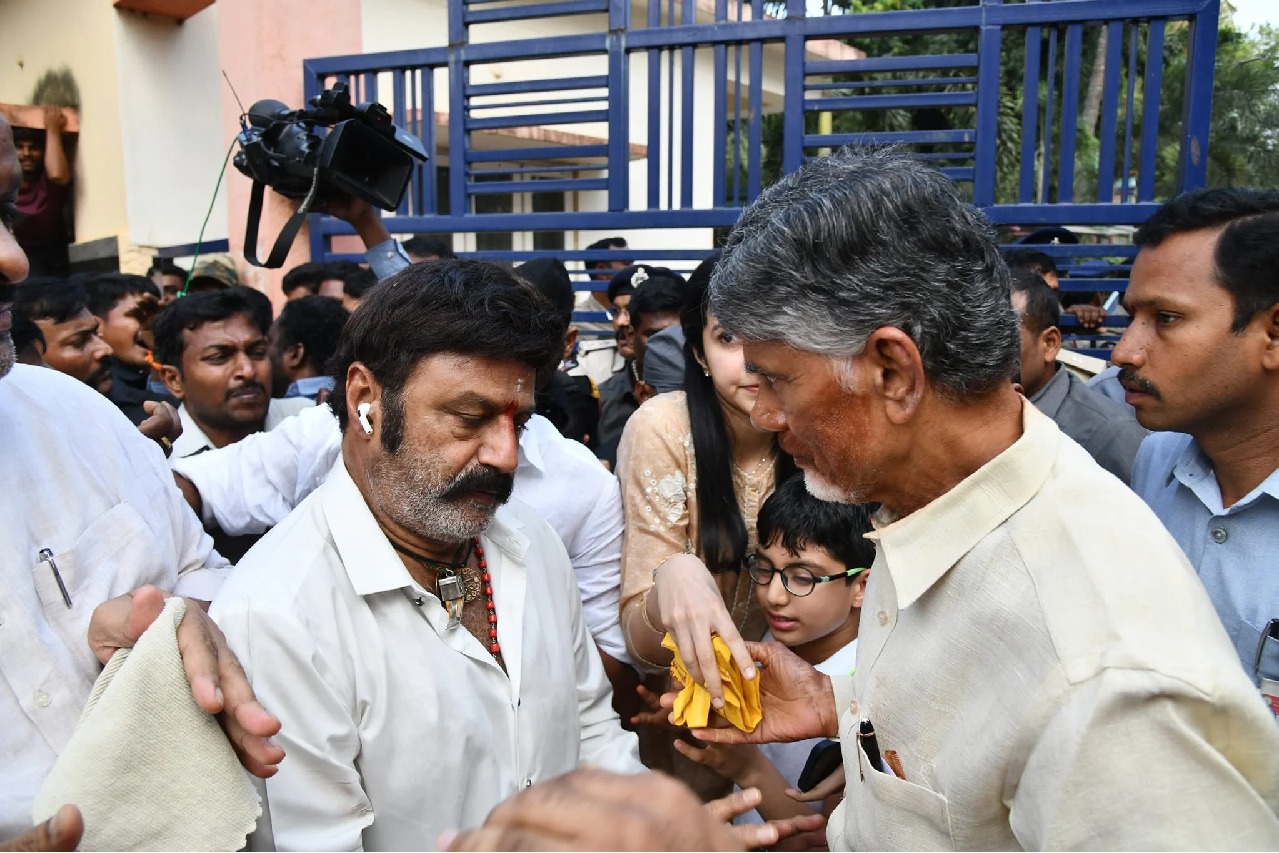 Balakrishna touches Chandrababu feet at Rajahmundry jail