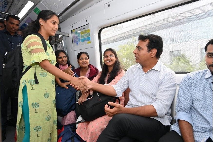 KTR interacts with people as he travels in Metro