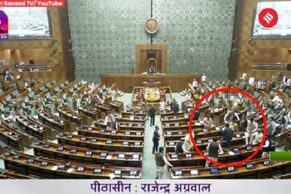Two men enter Lok Sabha open tear gas canisters