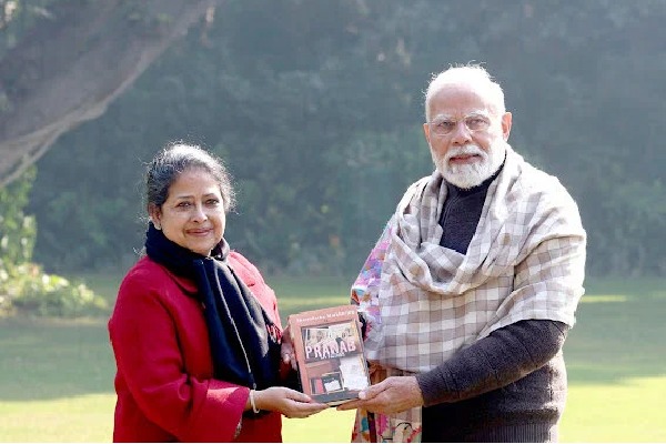 Pranab Mukherjee Daughter Presents A Copy Of Her Book To PM Modi