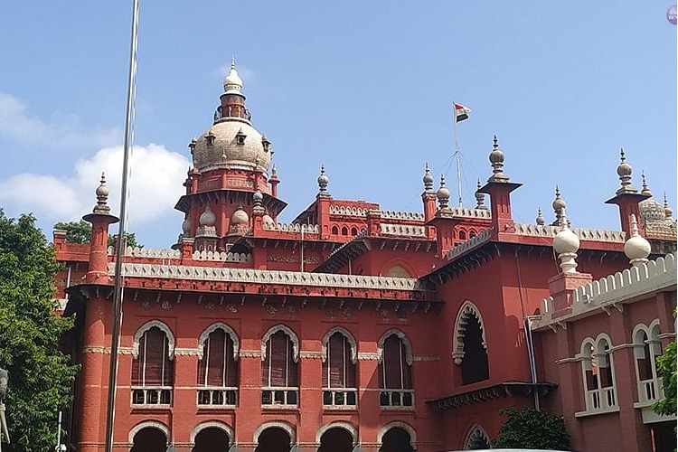 Non Hindu not allowed beyond flagpole area in temples rules Madras HC