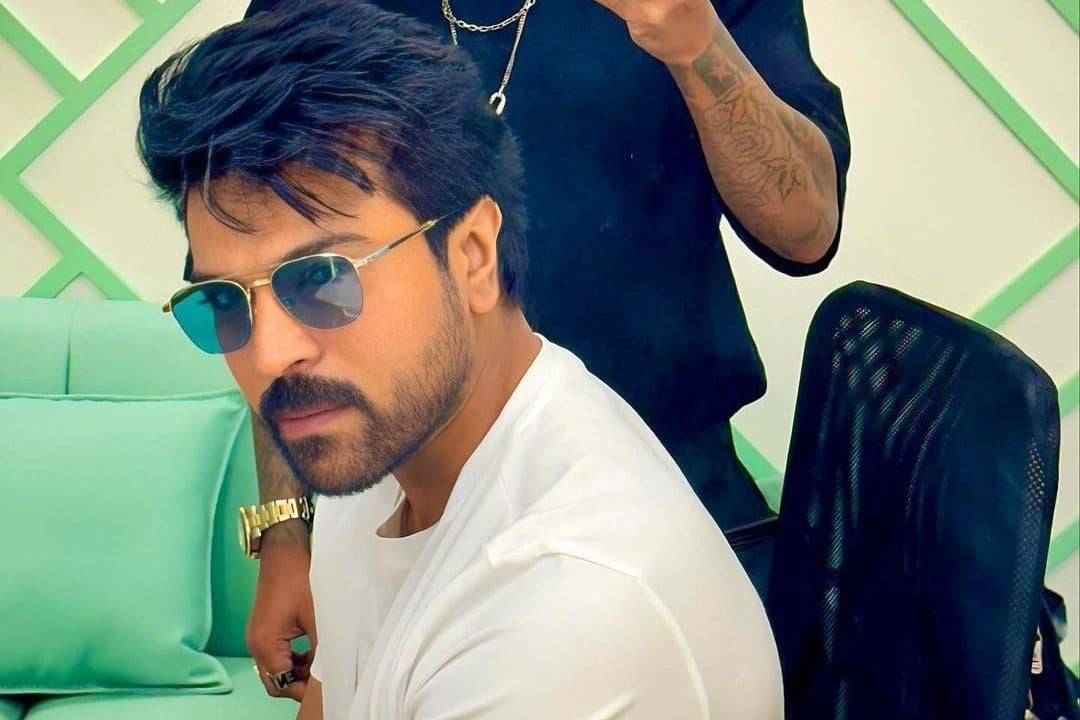 Ram Charan with new hair style