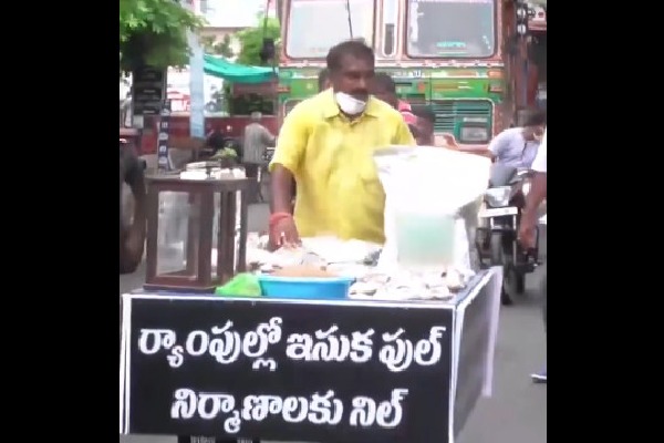 Nimmala Ramanaidu protests by selling sand packets 