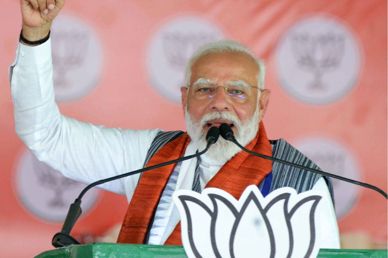 PM Modi takes opposition to cleaners on EVMs, once again