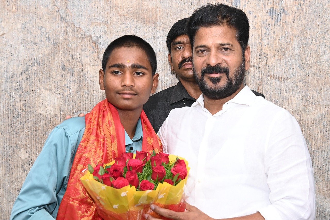 CM Revanth Reddy felicitates Sai Charan who saved six labour lives from fire accident