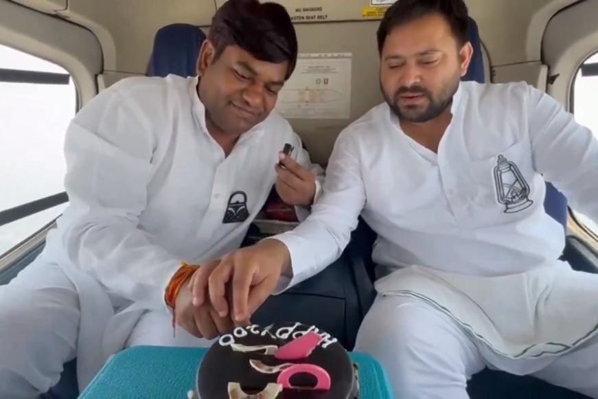 JD-U takes a jibe at Tejashwi Yadav over mid air cake-cutting in helicopter