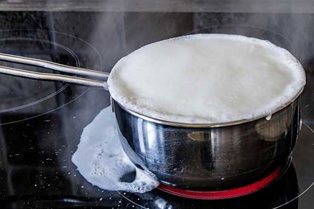 Milk Broken while boiling husband thrashes wife with pipe
