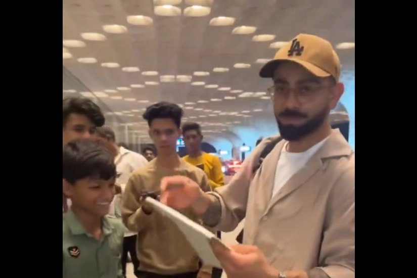 Virat Kohli leaves for the USA gives autograph to fan at Mumbai Airport