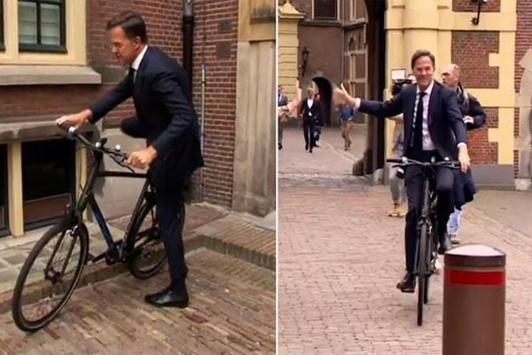 Ex Netherlands PM Mark Rutte leaves office on bicycle after handing over power to successor Dick Schoof