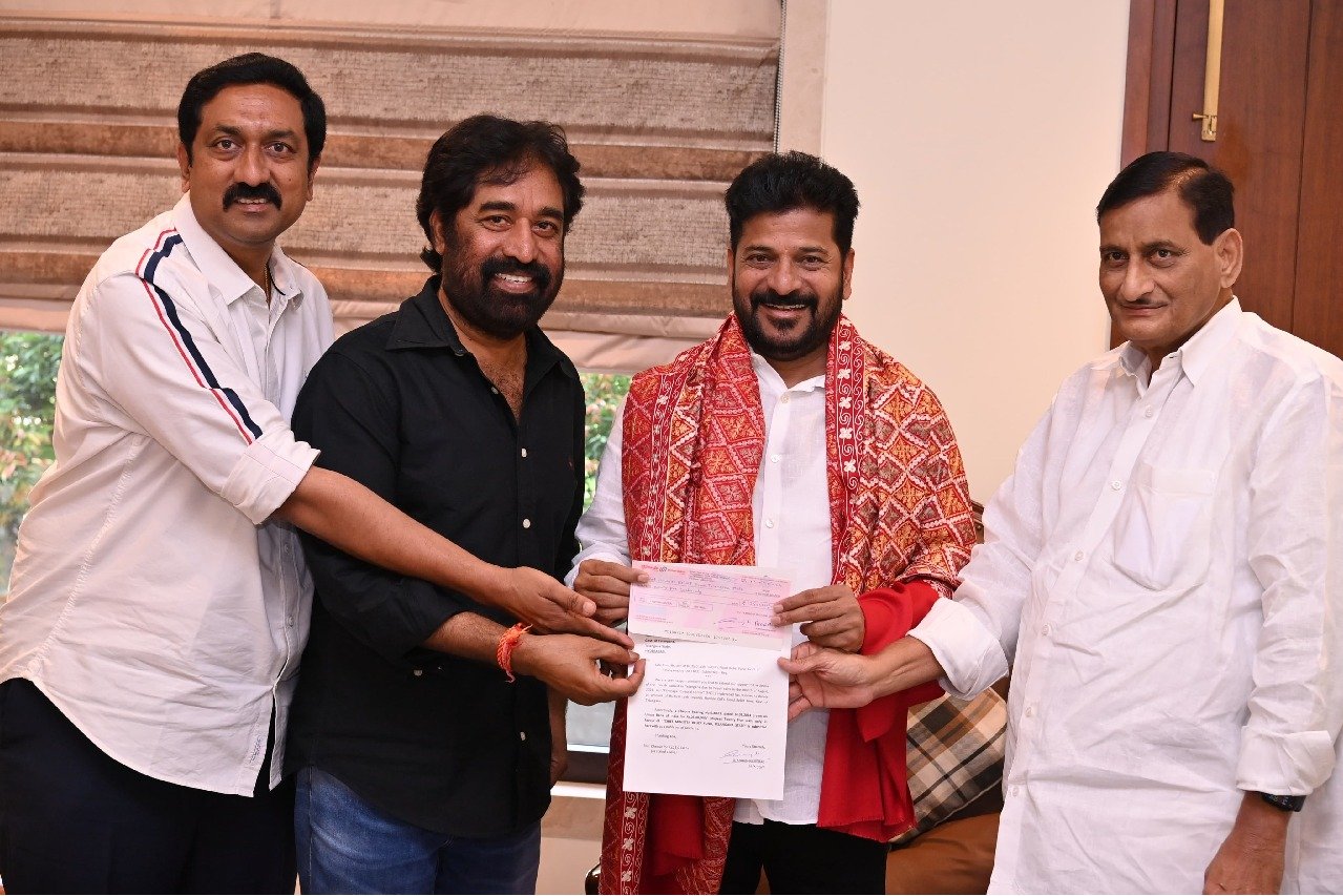 Adisheshagiri Rao gives rs 25 lakh cheque to CM Revanth Reddy