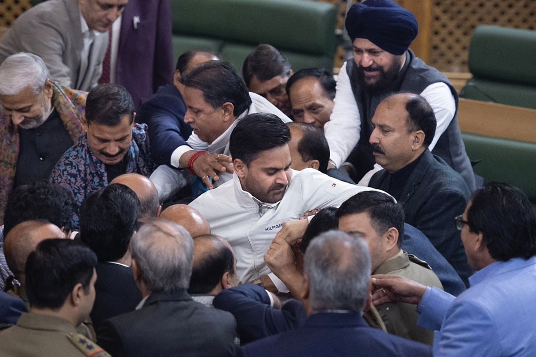 Chaos in Jammu and K Assembly after Khurshid Ahmad Sheikh shows Article 370 banner