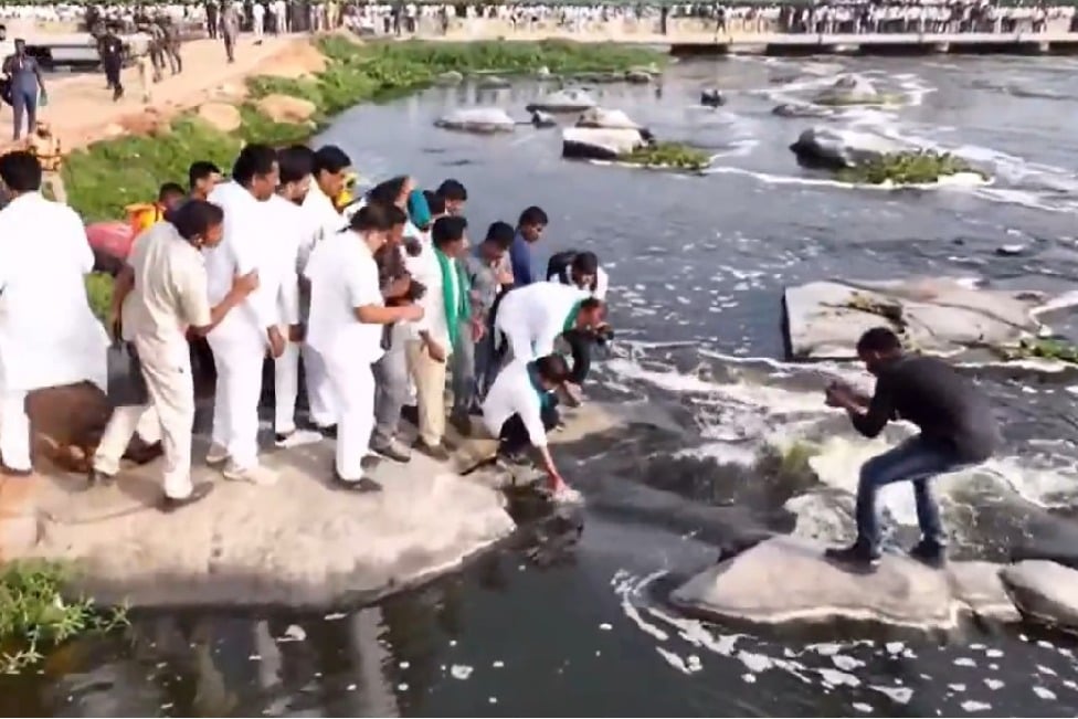 CM Revanth Reddy take Musi water in bottle