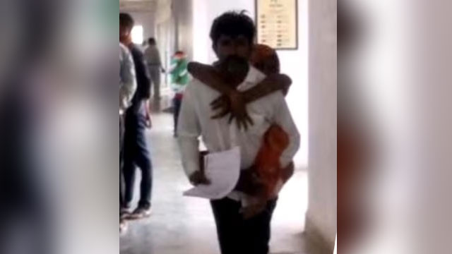 Pushpendra Singh carries disabled wife on back to Collectorate proof of ten years negligence