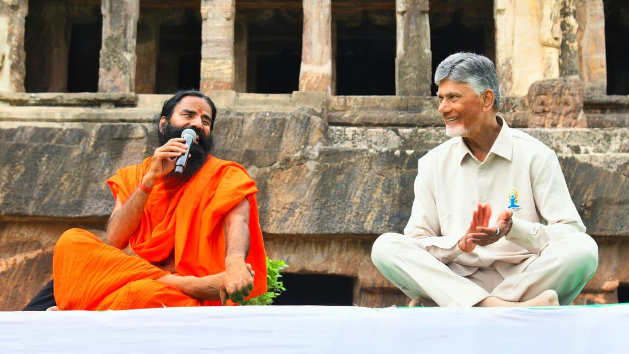Chandrababu is a Karma Yogi every CM should work like him says Baba Ramdev