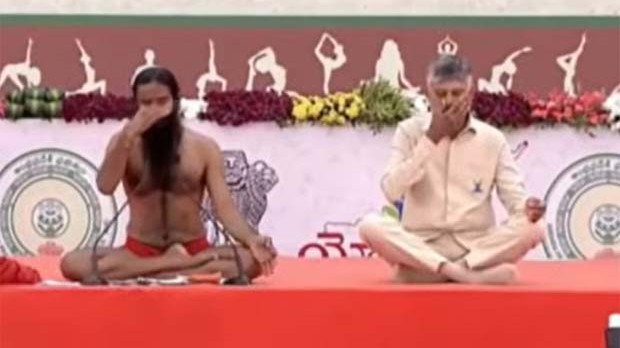 Chandrababu Naidu practices yoga with Baba Ramdev in Vijayawada