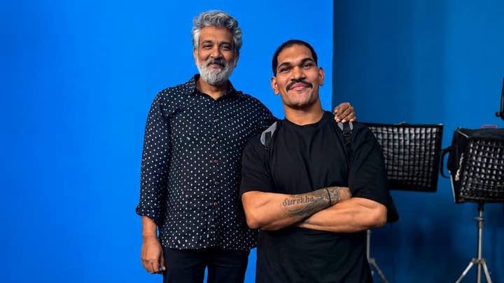 Rajamouli on Varanasi sets with MMA fighter who is Yogesh Jadhav