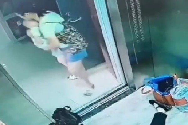 Surveillance camera captured the touching moment when a young mom
