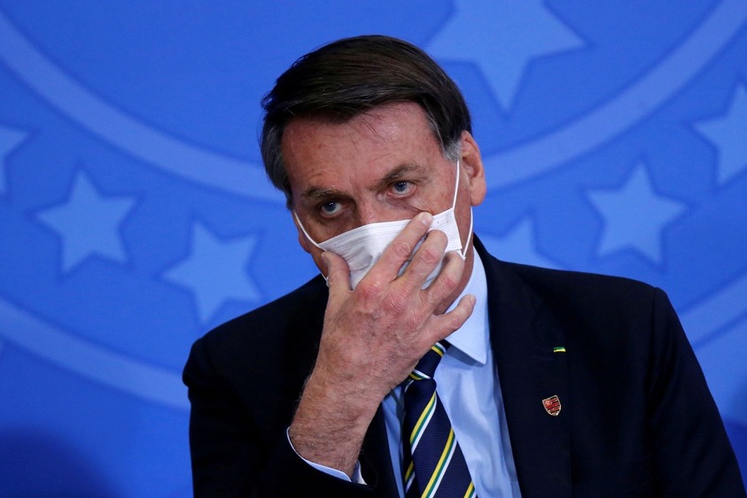 brazil president fires on journalist
