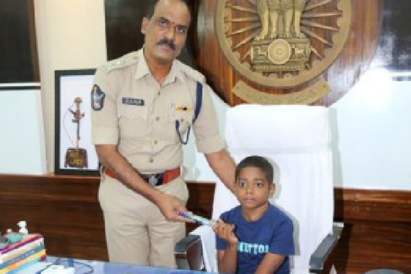 Guntur SP Ammireddy handed over his charge to a cancer child