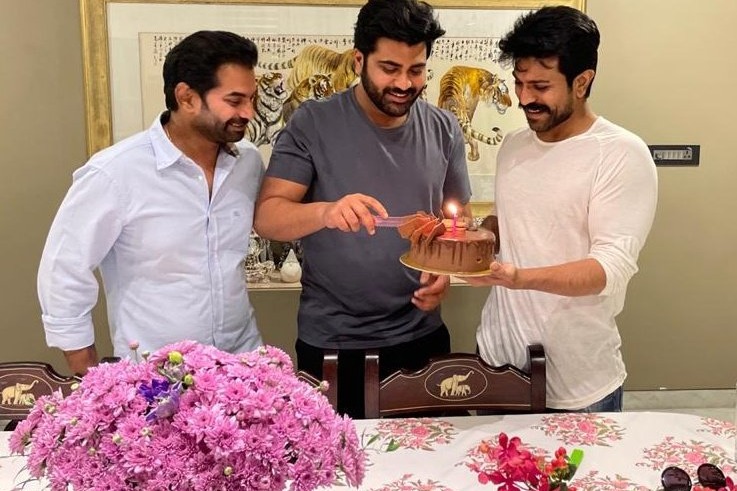 ram charan gives surprize to sharvanand