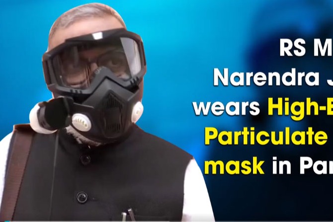 Rajya Sabha MP Narendra Jadhav wears High Efficiency Particulate Air filter mask in Parliament
